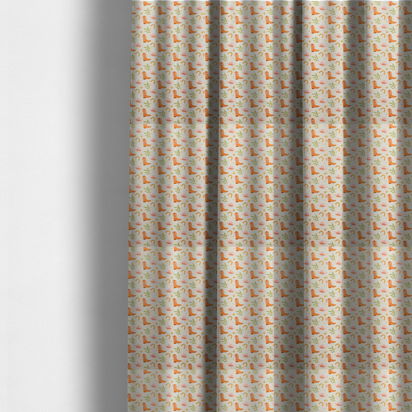 The fabric used to create these made-to-measure curtains is a repeating pattern of cowboy-themed illustrations on a cream-coloured fabric backdrop. The design features light orange cowboy boots, pale pink cowboy hats, golden horseshoes, small green leafy sprigs, and delicate four-pointed stars scattered throughout.