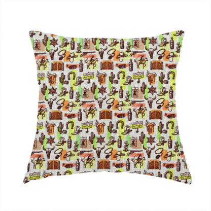 The fabric used to create this handmade cushion is a dense, repeating vintage western pattern featuring retro sketch-style illustrations over a textured, linen-look light grey background. The black-ink sketches are highlighted by abstract blocks of colour in lime green, terracotta orange, and muted brown, giving the fabric a mid-century modern or retro pop-art feel.