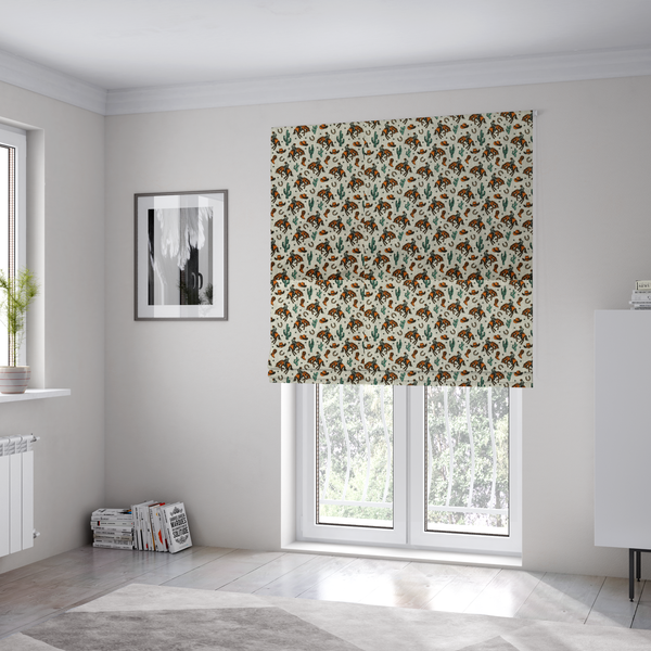 The fabric used to create these Roman blinds is a seamless, repeating pattern featuring traditional western motifs in a classic comic or illustration style, set against a textured, light oatmeal or linen-look background. The colour palette relies heavily on bold terracotta orange, deep teal green, and dark brown accents.