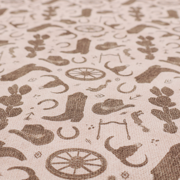 A repeating toile-style western pattern featuring classic cowboy motifs printed in a monochromatic, textured medium-brown hue against a light beige background.