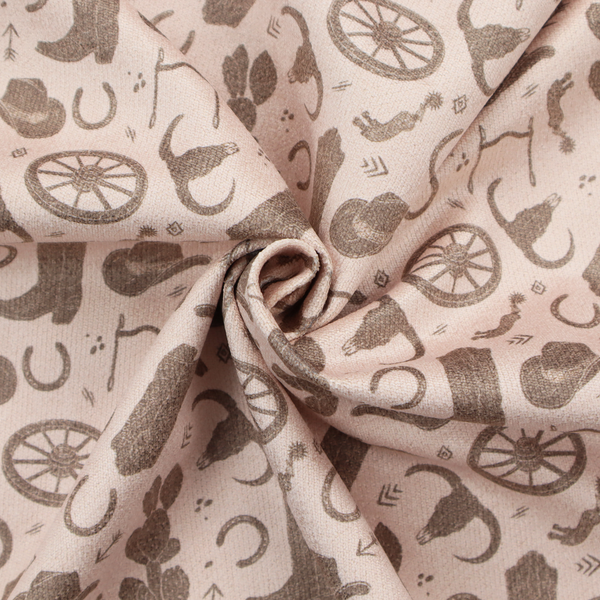A repeating toile-style western pattern featuring classic cowboy motifs printed in a monochromatic, textured medium-brown hue against a light beige background.