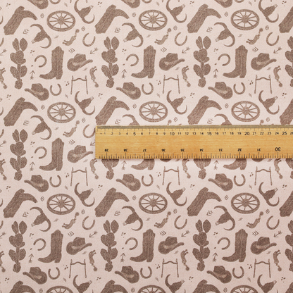 A repeating toile-style western pattern featuring classic cowboy motifs printed in a monochromatic, textured medium-brown hue against a light beige background.