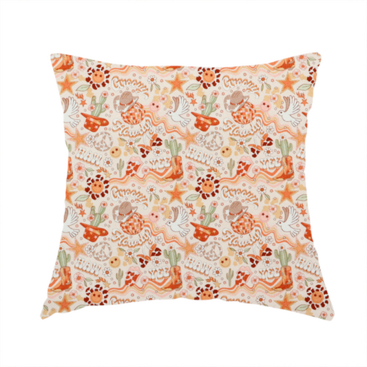 the fabric used to create this handmade cushion is a vibrant, repeating pattern blending 1970s retro elements with a western aesthetic, set against a light cream-colored background. The design uses a warm colour palette of terracotta orange, muted mustard yellow, sage green, and soft tan.