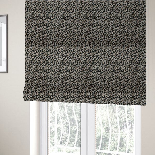 the fabric used to create these Roman blinds is a dense, repeating pattern featuring black graphic silhouettes of classic southwestern and western elements printed on a heavily textured, woven beige fabric base.