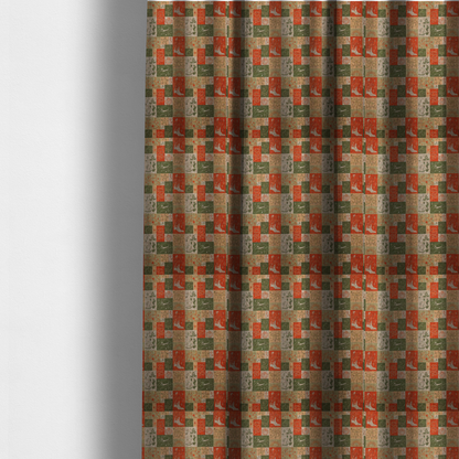 The fabric used to create these made-to-measure curtains is a repeating geometric patchwork pattern featuring western motifs framed inside distinct rectangular and square tiles. The design is printed on a heavily woven, textured linen-look fabric base. The Earth-toned colour palette consists of rich terracotta orange, olive green, muted sage, and warm cream.