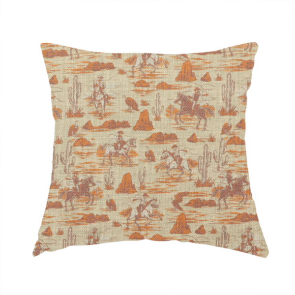 The fabric used to create this handmade cushion is a repeating, scenic western toile pattern featuring detailed sketch-style illustrations over a heavily textured, linen-look light beige background. The monochrome design is rendered in warm tones of terracotta orange, rust, and dusty brown.