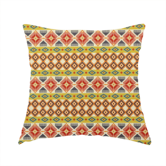 The fabric used to create this handmade cushion is a vibrant, multi-coloured southwestern stripe pattern featuring repeating horizontal bands of geometric, tribal-inspired motifs. The detailed design is printed on a textured, linen-look cream fabric background, utilizing a bold colour palette of mustard yellow, terracotta red, slate blue-grey, and rust orange.