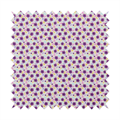 A dense, small-scale ditsy floral print. The pattern is composed of miniature five-petal magenta flowers outlined in dark purple, scattered symmetrically alongside tiny pastel pink blossoms, lavender leaves, and small ochre yellow botanical accents across a light, textured off-white background.