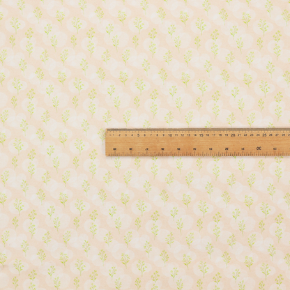 A soft watercolour design. The background consists of a subtle pastel peach wash layered with faint, painterly off-white circular polka dots. Arranged in neat diagonal rows over the circles are miniature, light lime green botanical sprigs and fine leaf stems.