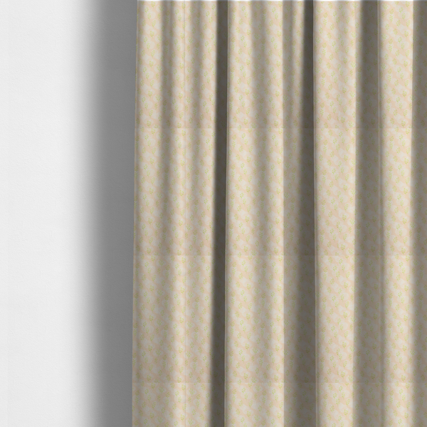 The fabric used to create these made-to-measure curtains is a soft watercolour design. The background consists of a subtle pastel peach wash layered with faint, painterly off-white circular polka dots. Arranged in neat diagonal rows over the circles are miniature, light lime green botanical sprigs and fine leaf stems.
