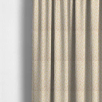 The fabric used to create these made-to-measure curtains is a soft watercolour design. The background consists of a subtle pastel peach wash layered with faint, painterly off-white circular polka dots. Arranged in neat diagonal rows over the circles are miniature, light lime green botanical sprigs and fine leaf stems.