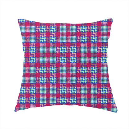 The fabric used to create this handmade cushion is a dense, multi-coloured hounds tooth plaid pattern. The design features alternating blocks of bright magenta pink, electric royal blue, and neon lime green, interwoven into a structured, repetitive grid check with a classic textured twill appearance.