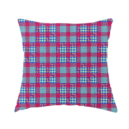 The fabric used to create this handmade cushion is a dense, multi-coloured hounds tooth plaid pattern. The design features alternating blocks of bright magenta pink, electric royal blue, and neon lime green, interwoven into a structured, repetitive grid check with a classic textured twill appearance.