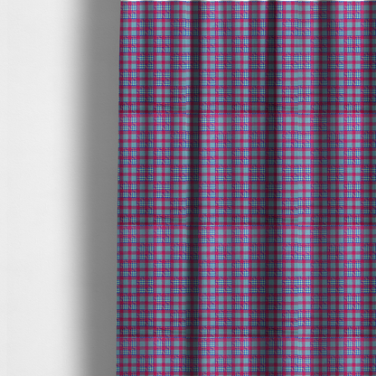 The fabric used to create these made-to-measure curtains is a dense, multi-coloured hounds tooth plaid pattern. The design features alternating blocks of bright magenta pink, electric royal blue, and neon lime green, interwoven into a structured, repetitive grid check with a classic textured twill appearance.