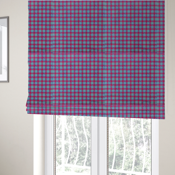 The fabric used to create these Roman blinds is a dense, multi-coloured hounds tooth plaid pattern. The design features alternating blocks of bright magenta pink, electric royal blue, and neon lime green, interwoven into a structured, repetitive grid check with a classic textured twill appearance.
