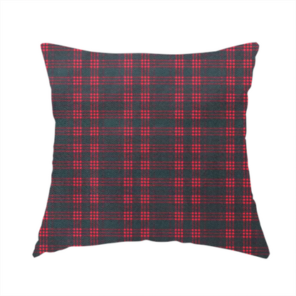 The fabric used to create this handmade cushion is a classic, moody plaid pattern. The design is woven onto a dark charcoal grey background with a subtle, textured herringbone pattern, overlaid with a structured grid of thin, repeating intersecting lines in a bright, contrasting crimson red.
