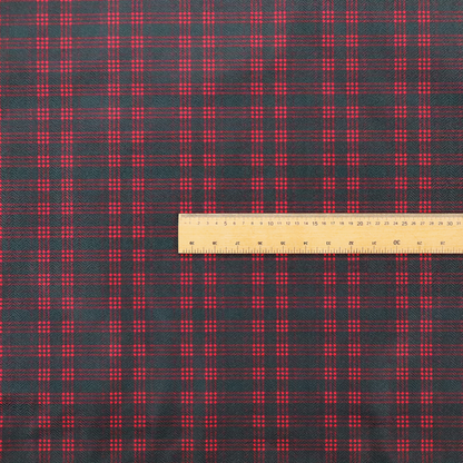A classic, moody plaid pattern. The design is woven onto a dark charcoal grey background with a subtle, textured herringbone pattern, overlaid with a structured grid of thin, repeating intersecting lines in a bright, contrasting crimson red.