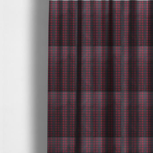 The fabric used to create these made-to-measure curtains is a classic, moody plaid pattern. The design is woven onto a dark charcoal grey background with a subtle, textured herringbone pattern, overlaid with a structured grid of thin, repeating intersecting lines in a bright, contrasting crimson red.