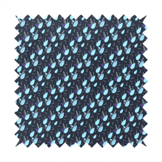 A dense, miniature botanical print. The design features small, light ice-blue teardrop shapes resembling abstract petals or water droplets, paired with tiny light blue textured leaves and white sprigs. The pattern is scattered over a dark charcoal grey background that features a subtle, woven herringbone texture.