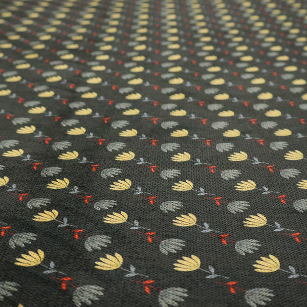 A neat, small-scale botanical pattern arranged in diagonal rows. The design showcases small, stylized fan-shaped flowers in a muted golden-yellow, interspersed with grey dandelions and tiny red leaves on thin stems.