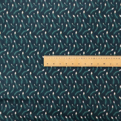 A dense, elegant peacock feather motif. The design showcase a repetitive pattern of small, curved green peacock feathers with bright orange, blue, and white "eyes" floating diagonally. The pattern is set against a dark charcoal grey background that has a subtle, woven herringbone texture.
