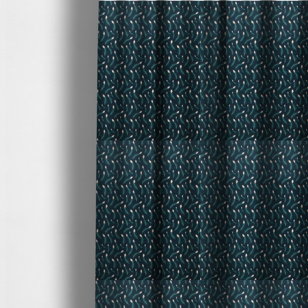 The fabric used to create these made-to-measure curtains is a dense, elegant peacock feather motif. The design showcase a repetitive pattern of small, curved green peacock feathers with bright orange, blue, and white "eyes" floating diagonally. The pattern is set against a dark charcoal grey background that has a subtle, woven herringbone texture.