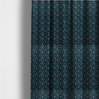 The fabric used to create these made-to-measure curtains is a dense, elegant peacock feather motif. The design showcase a repetitive pattern of small, curved green peacock feathers with bright orange, blue, and white "eyes" floating diagonally. The pattern is set against a dark charcoal grey background that has a subtle, woven herringbone texture.