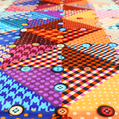 A vibrant, multi-coloured faux patchwork fabric pattern composed of alternating right-angled triangles to form a geometric grid. Each triangular patch features a distinct retro design, including hound's-tooth, gingham checks, diagonal plaids, and polka dots in various scales.