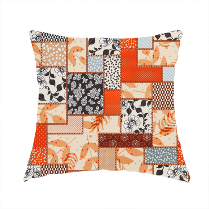 The fabric used to create this handmade cushion is a patchwork fabric pattern featuring a mix of rectangular blocks with floral prints, polka dots, autumn leaves, and geometric shapes in orange, beige, brown, and black-and-white.