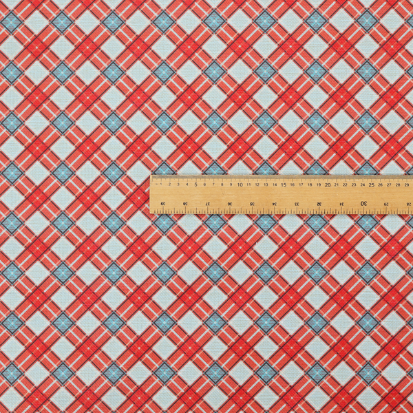 A vibrant diagonal plaid fabric pattern featuring crossing red, light blue, and white stripes on a textured background.
