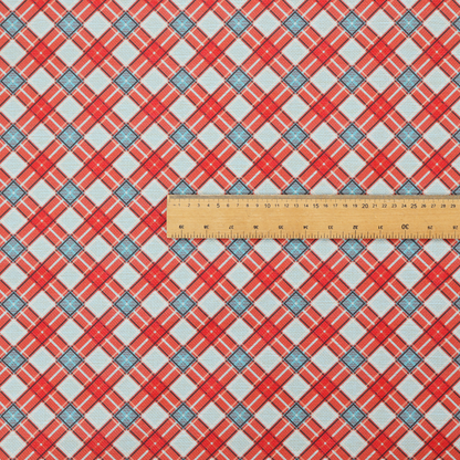 A vibrant diagonal plaid fabric pattern featuring crossing red, light blue, and white stripes on a textured background.