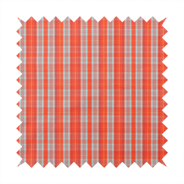 A bright plaid fabric pattern featuring thin, intersecting stripes of orange, light teal, and yellow on a textured background.