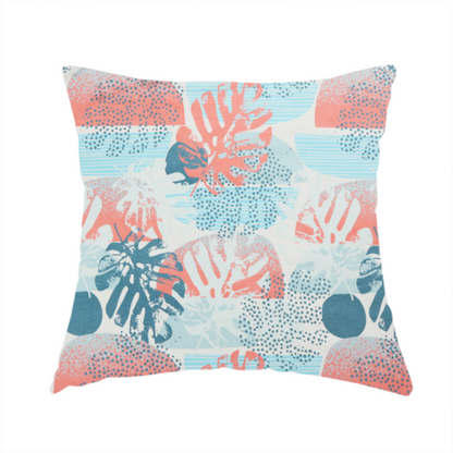 The fabric used to create this handmade cushion is an abstract tropical fabric pattern featuring monstera leaf silhouettes and mid-century geometric shapes in coral, teal, aqua, and cream.