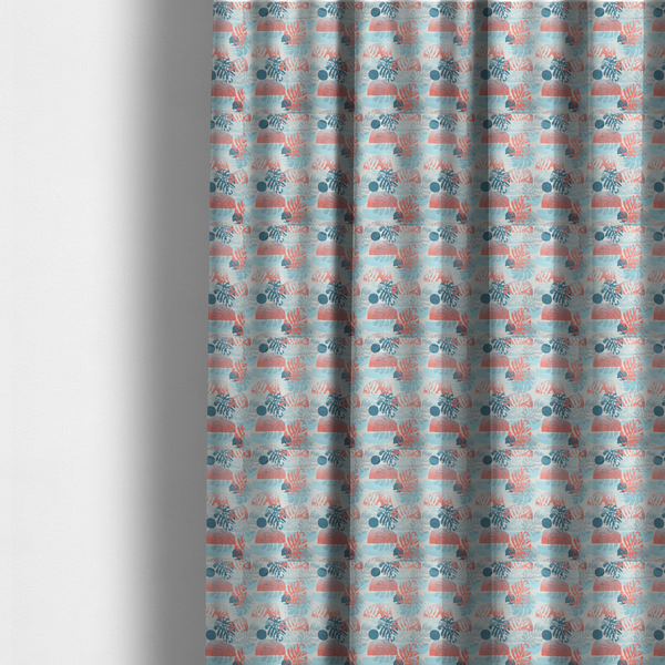 The fabric used to create these made-to-measure curtains is an abstract tropical fabric pattern featuring monstera leaf silhouettes and mid-century geometric shapes in coral, teal, aqua, and cream.