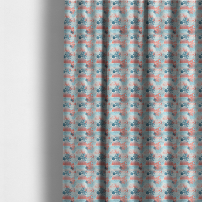 The fabric used to create these made-to-measure curtains is an abstract tropical fabric pattern featuring monstera leaf silhouettes and mid-century geometric shapes in coral, teal, aqua, and cream.