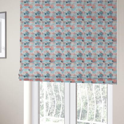 The fabric used to create these Roman blinds is an abstract tropical fabric pattern featuring monstera leaf silhouettes and mid-century geometric shapes in coral, teal, aqua, and cream.