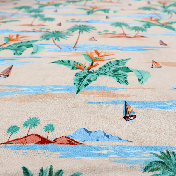 Vintage-style Hawaiian scenic fabric featuring palm trees, small sailboats, and orange Bird of Paradise flowers on a sandy beige background.