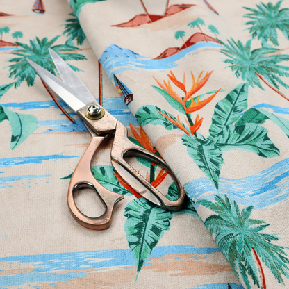 Vintage-style Hawaiian scenic fabric featuring palm trees, small sailboats, and orange Bird of Paradise flowers on a sandy beige background.