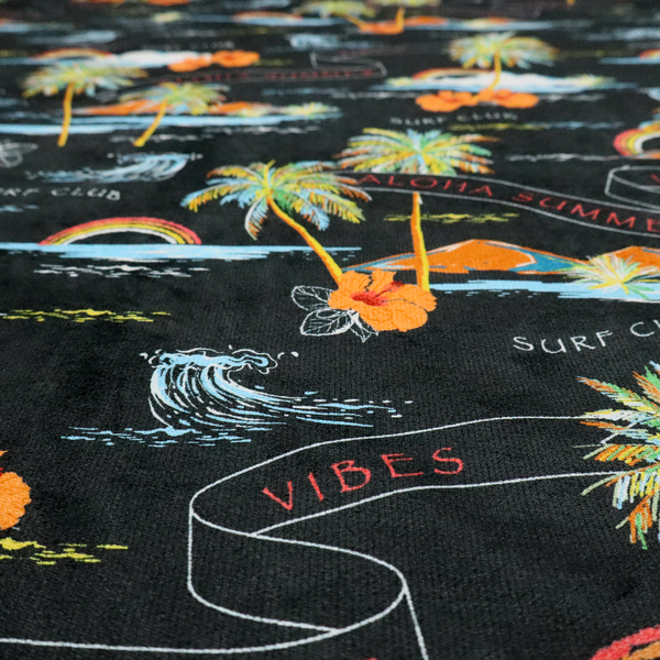 Retro black tropical fabric featuring neon palm trees, rainbows, orange hibiscus flowers, and vintage ribbons reading "Aloha Summer" and "Vibes".