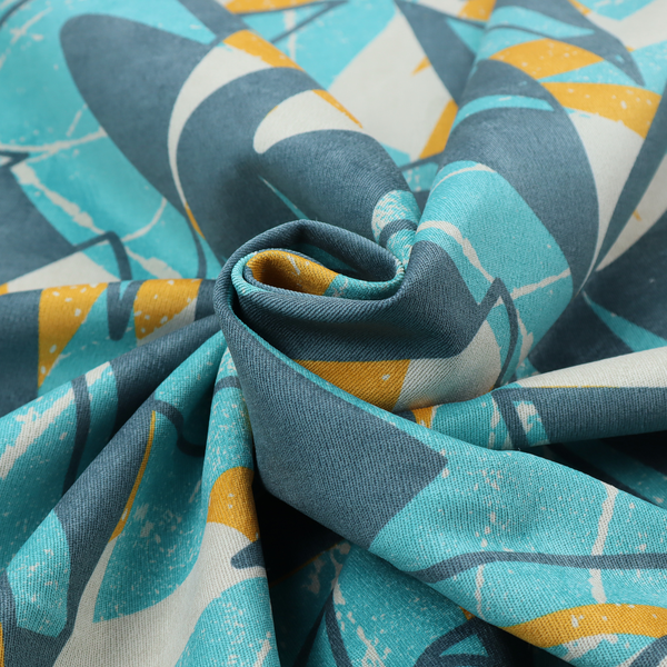 Fabric featuring a bold, retro geometric pattern with abstract, sharp arrow and shard shapes in turquoise, slate blue, mustard yellow, and white with a distressed texture.