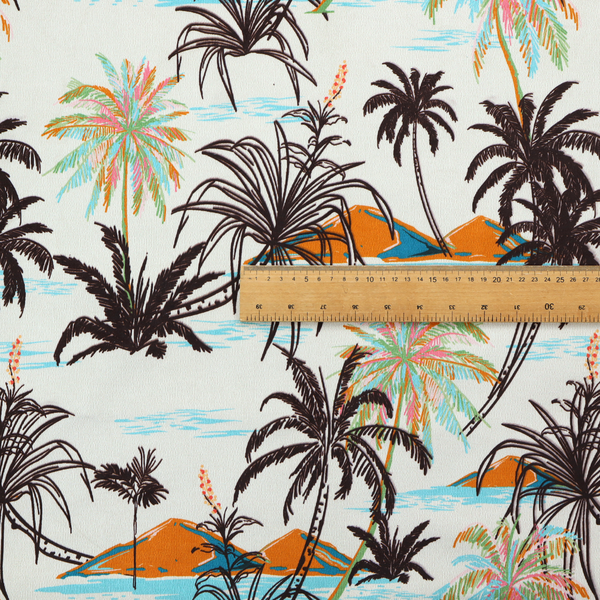 Fabric featuring a vintage-inspired tropical pattern with dark brown line-art palm trees, colourful pastel palm trees, and small orange islands against an off-white background.