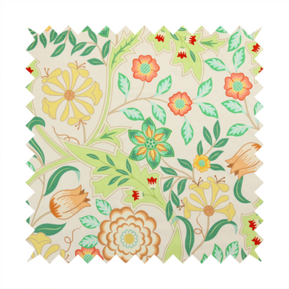 An Arts and Crafts style botanical fabric pattern set against a cream-colored background. The heritage design features winding beige vines interwoven with large, stylized acanthus leaves in soft sage and lime greens.