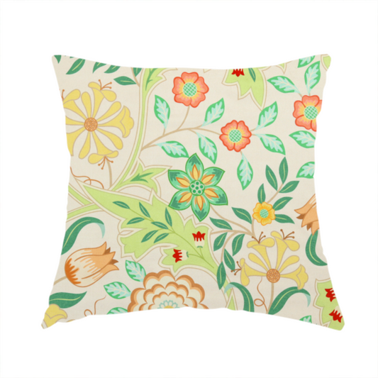 The fabric used to create this handmade cushion is a Arts and Crafts style botanical fabric pattern set against a cream-colored background. The heritage design features winding beige vines interwoven with large, stylized acanthus leaves in soft sage and lime greens.
