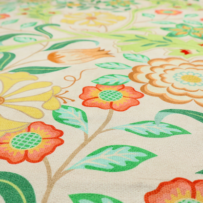 An Arts and Crafts style botanical fabric pattern set against a cream-colored background. The heritage design features winding beige vines interwoven with large, stylized acanthus leaves in soft sage and lime greens.