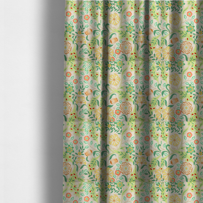 The fabric used to create these made-to-measure curtains is a Arts and Crafts style botanical fabric pattern set against a cream-colored background. The heritage design features winding beige vines interwoven with large, stylized acanthus leaves in soft sage and lime greens.