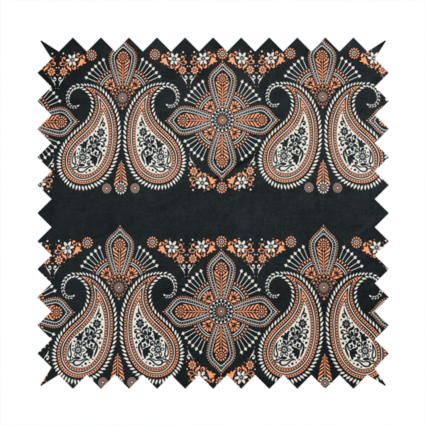 A black fabric pattern featuring elegant horizontal bands of intricate paisley motifs and ornate cross-shaped designs in cream and terracotta orange.