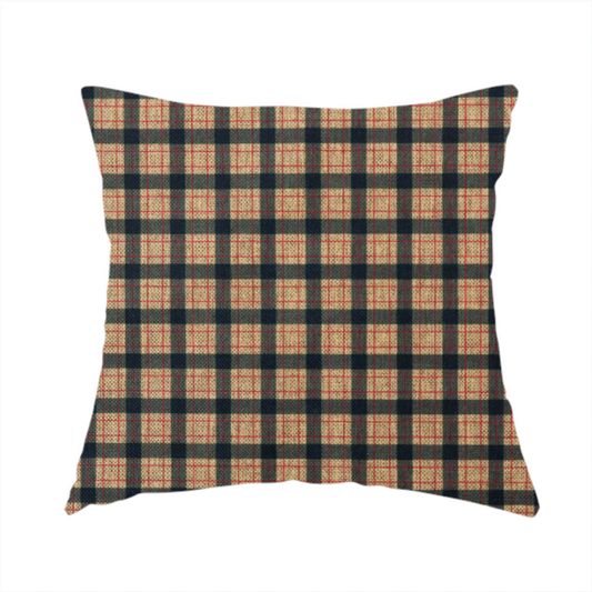 The fabric used to create this handmade cushion is a rustic plaid fabric pattern featuring a grid of intersecting navy blue and tan stripes with thin red accent lines.