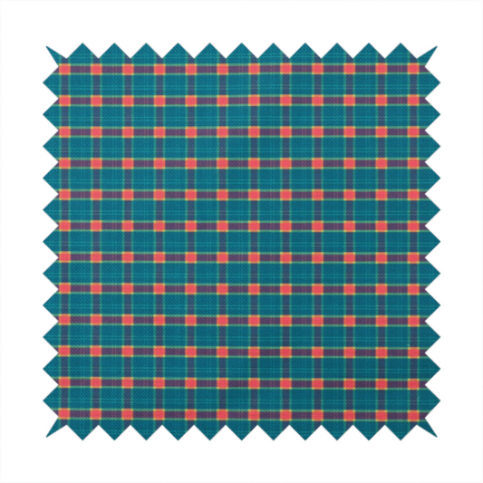 A rich teal plaid fabric pattern featuring a dense grid of intersecting dark blue and thin yellow stripes with bright red square accents.