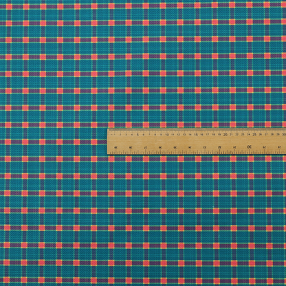 A rich teal plaid fabric pattern featuring a dense grid of intersecting dark blue and thin yellow stripes with bright red square accents.