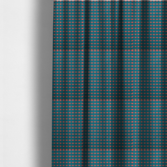 The fabric used to create these made-to-measure curtains is a rich teal plaid fabric pattern featuring a dense grid of intersecting dark blue and thin yellow stripes with bright red square accents.